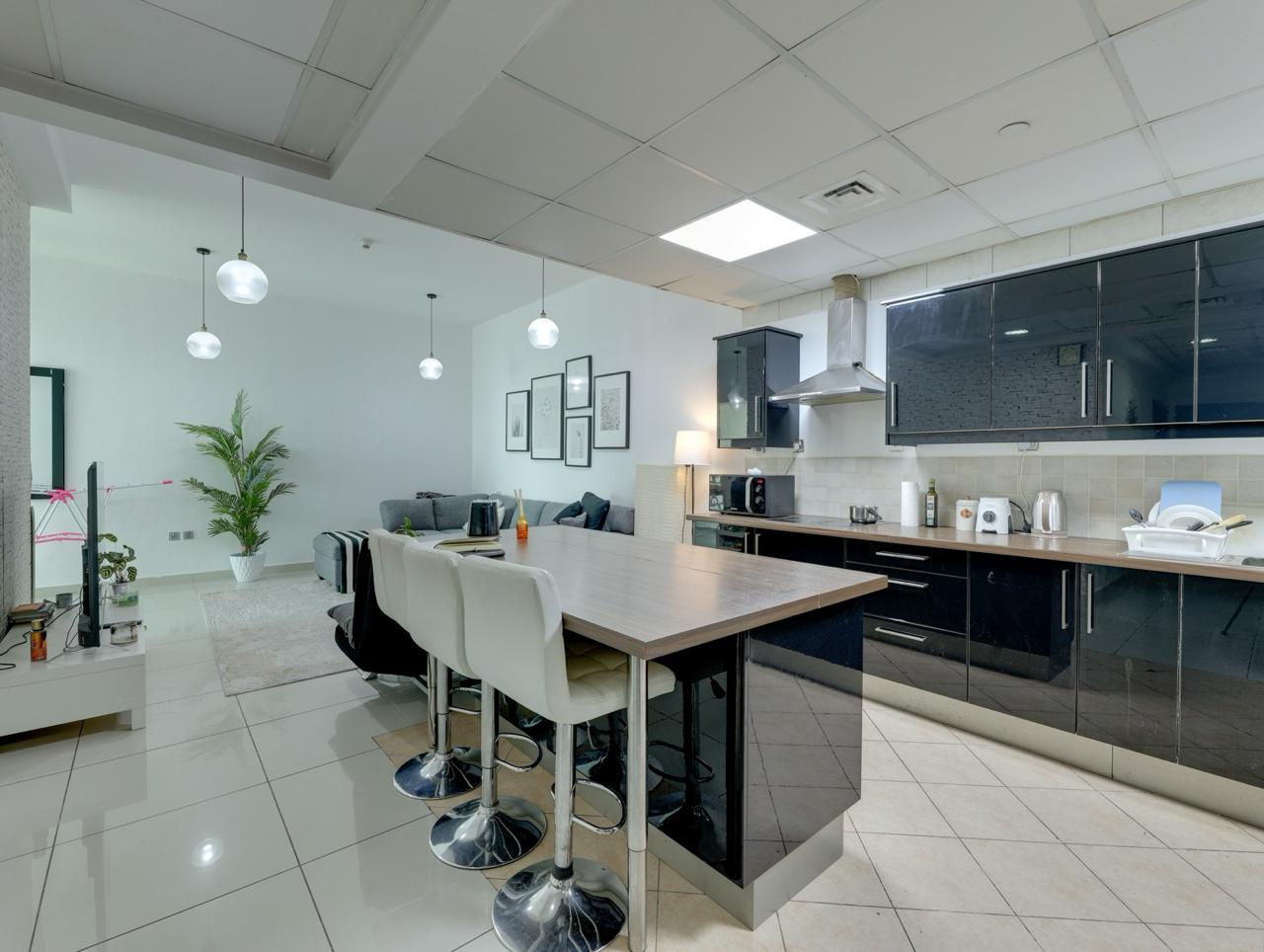 From Contrast to Calm: A Scandinavian Living and Kitchen Transformation - Image 1